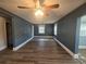 Spacious living room with hardwood floors and ceiling fans at 143 44Th N Ave, St Petersburg, FL 33703
