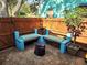 Cozy patio with blue cinder block benches at 143 44Th N Ave, St Petersburg, FL 33703