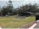 House with a landscaped yard and rock garden at 1505 E Park Cir, Tampa, FL 33610