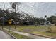 Large lot with mature trees and a spacious front yard at 1505 E Park Cir, Tampa, FL 33610