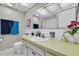Bathroom with a sink, toilet, and shower at 19029 Us Highway 19 N # 5-1, Clearwater, FL 33764