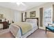 Bedroom with a double bed and ensuite bathroom at 19029 Us Highway 19 N # 5-1, Clearwater, FL 33764