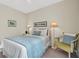 Bedroom with a double bed and window at 19029 Us Highway 19 N # 5-1, Clearwater, FL 33764