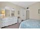 Bedroom with a double bed and dresser at 19029 Us Highway 19 N # 5-1, Clearwater, FL 33764
