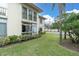 Landscaped patio area adjacent to the building at 19029 Us Highway 19 N # 5-1, Clearwater, FL 33764