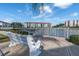 Scenic waterfront walkway with a peaceful bench at 19029 Us Highway 19 N # 5-1, Clearwater, FL 33764