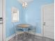 Small breakfast nook with a round table and two chairs at 1918 Virginia Dr, Bradenton, FL 34205