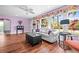 Light and airy living room with hardwood floors and ample natural light at 1918 Virginia Dr, Bradenton, FL 34205