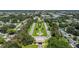 Wide aerial showing community entrance at 2460 Canadian Way # 6, Clearwater, FL 33763