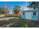 This fenced-in backyard features a shed, and provides ample outdoor space at 5524 Kentucky Ave, New Port Richey, FL 34652