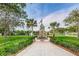 Community park featuring war memorial, sidewalks, landscaping, and a water feature at 5524 Kentucky Ave, New Port Richey, FL 34652