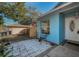 Charming blue single-Gathering home with a well-maintained patio area and a one-car garage at 5524 Kentucky Ave, New Port Richey, FL 34652