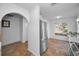 Bright kitchen area with stainless steel refrigerator and tile floors at 5524 Kentucky Ave, New Port Richey, FL 34652