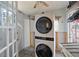 Stacked LG washer and dryer in a small laundry room at 6407 1St Palm Pt, St Pete Beach, FL 33706