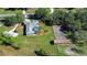 Aerial view showing home, pool, and barn at 8345 Shenandoah Run, Wesley Chapel, FL 33544