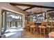 Home bar with view of the pool and patio at 8345 Shenandoah Run, Wesley Chapel, FL 33544