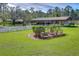 Horse barn with lush green surroundings at 8345 Shenandoah Run, Wesley Chapel, FL 33544