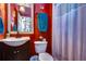 Small bathroom with dark vanity and shower at 8345 Shenandoah Run, Wesley Chapel, FL 33544