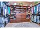 Large walk-in closet with ample shelving and hanging space at 8345 Shenandoah Run, Wesley Chapel, FL 33544