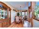 Formal dining room with hardwood floors and built-in hutch at 8345 Shenandoah Run, Wesley Chapel, FL 33544