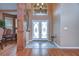 Elegant entry with double doors and hardwood floors at 8345 Shenandoah Run, Wesley Chapel, FL 33544