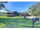 Spacious home with a large yard and circular driveway at 8345 Shenandoah Run, Wesley Chapel, FL 33544