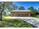 Detached two-car garage with stone accents at 8345 Shenandoah Run, Wesley Chapel, FL 33544