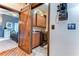 Convenient laundry room with washer, dryer, and ample storage at 8345 Shenandoah Run, Wesley Chapel, FL 33544