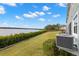 Waterfront backyard with lush landscaping and a view at 1003 Starboard Ct, Oldsmar, FL 34677