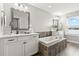 Elegant bathroom with soaking tub and double vanity at 1003 Starboard Ct, Oldsmar, FL 34677