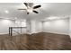 Spacious bonus room with hardwood floors and ceiling fan at 1003 Starboard Ct, Oldsmar, FL 34677