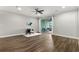Spacious living area with hardwood floors and sliding glass doors at 1003 Starboard Ct, Oldsmar, FL 34677
