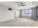 Main bedroom with lake view and ceiling fan at 1003 Starboard Ct, Oldsmar, FL 34677