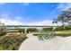 Relaxing waterfront patio with seating and kayaks at 1003 Starboard Ct, Oldsmar, FL 34677
