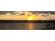 Scenic sunset over calm water with a bridge and pier at 1003 Starboard Ct, Oldsmar, FL 34677