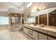 Primary bathroom with a large soaking tub and double vanity at 18409 Tyler Rd, Odessa, FL 33556