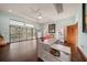 Bedroom with light walls, large windows, and a desk area at 18409 Tyler Rd, Odessa, FL 33556
