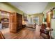 Comfortable bedroom with wood floors and access to the backyard at 18409 Tyler Rd, Odessa, FL 33556