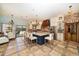 Gourmet kitchen with large island, stainless steel appliances, and custom cabinetry at 18409 Tyler Rd, Odessa, FL 33556
