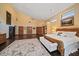 Main bedroom with hardwood floors, large windows, and ample space at 18409 Tyler Rd, Odessa, FL 33556