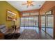 Relaxing office space with lake views and a comfortable recliner at 18409 Tyler Rd, Odessa, FL 33556