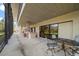 Outdoor patio with seating area, adjacent to kitchen access at 18409 Tyler Rd, Odessa, FL 33556