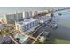 Aerial view of waterfront property, showing building and boat docks at 20001 Gulf Blvd # 501, Indian Shores, FL 33785