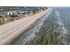 Aerial view of beachfront property with homes and ocean at 20001 Gulf Blvd # 501, Indian Shores, FL 33785