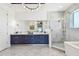 Luxurious bathroom with marble finishes and double vanity at 20001 Gulf Blvd # 501, Indian Shores, FL 33785