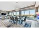 Elegant dining room with glass table and modern chairs at 20001 Gulf Blvd # 501, Indian Shores, FL 33785
