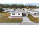 Aerial view of the house and surrounding neighborhood at 36925 Kiowa Ave, Zephyrhills, FL 33542