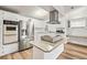 Modern kitchen with stainless steel appliances and an island at 36925 Kiowa Ave, Zephyrhills, FL 33542