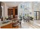 Elegant dining area with stained glass windows and chandelier at 6015 Kipps Colony E Dr, Gulfport, FL 33707