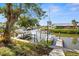 Peaceful waterfront view with boats docked along the canal at 9386 Tradewinds Ave, Seminole, FL 33776